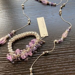 Long silver necklace and stretch bracelet